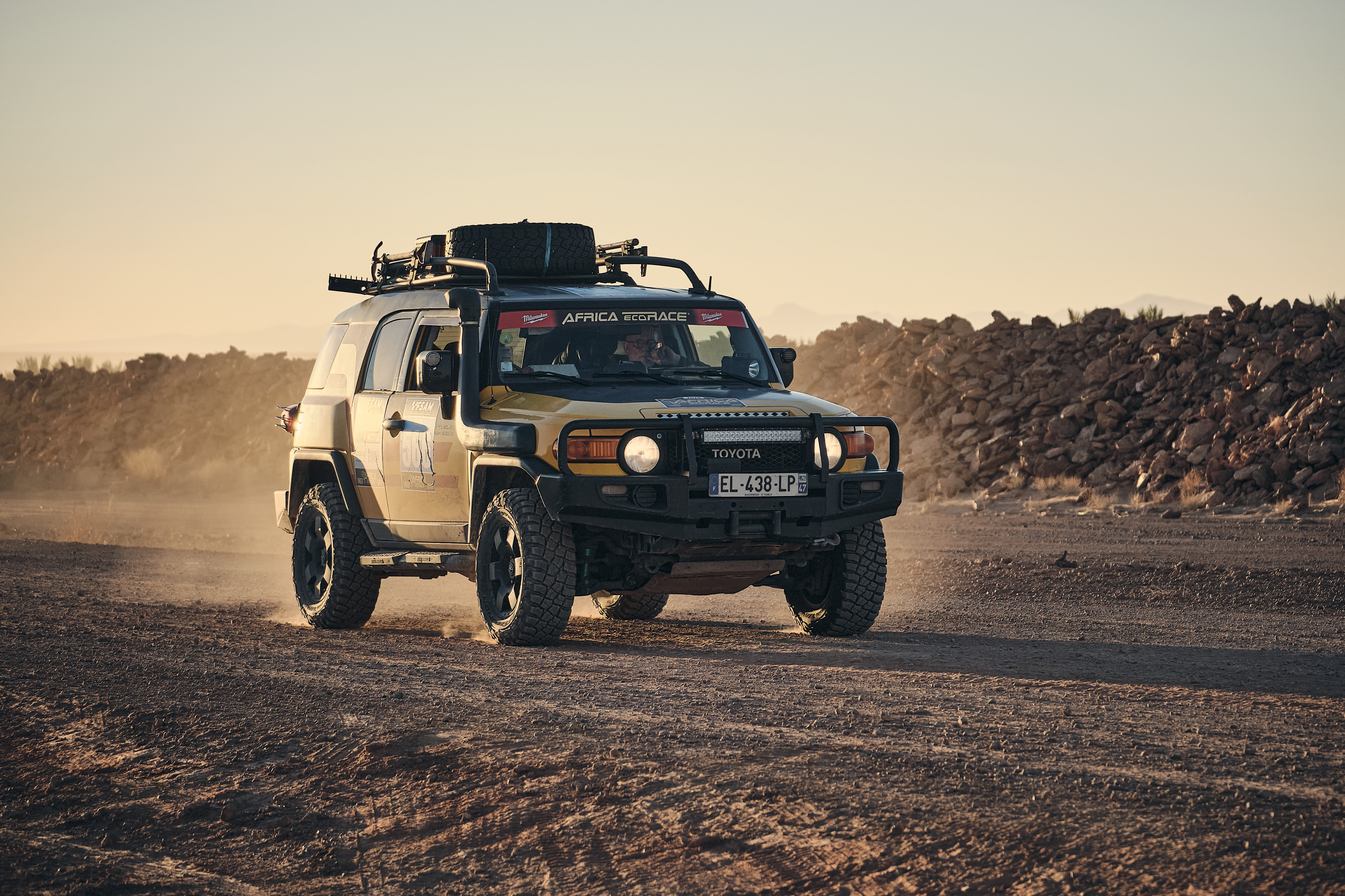 Bike and 4x4 at sunset